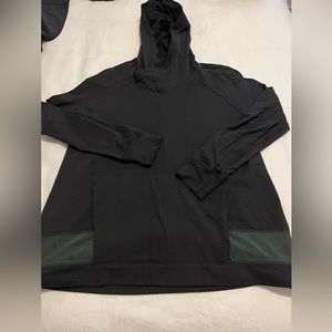 Lululemon black hooded pull over. Size 4.